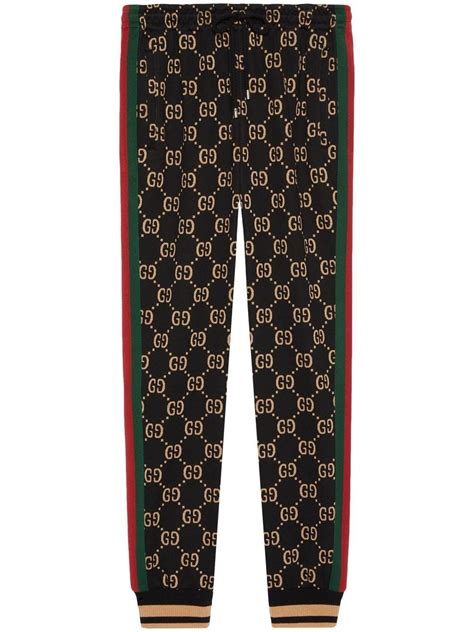 gucci grafitti print pants|gucci tapered jeans.